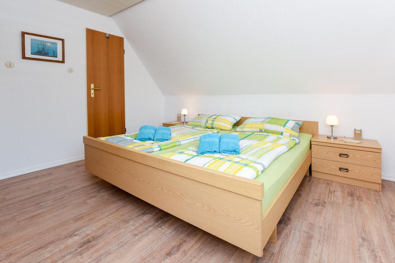 Ferienwohnungen Im Haus Waterkant Neuharlingersiel Exterior foto