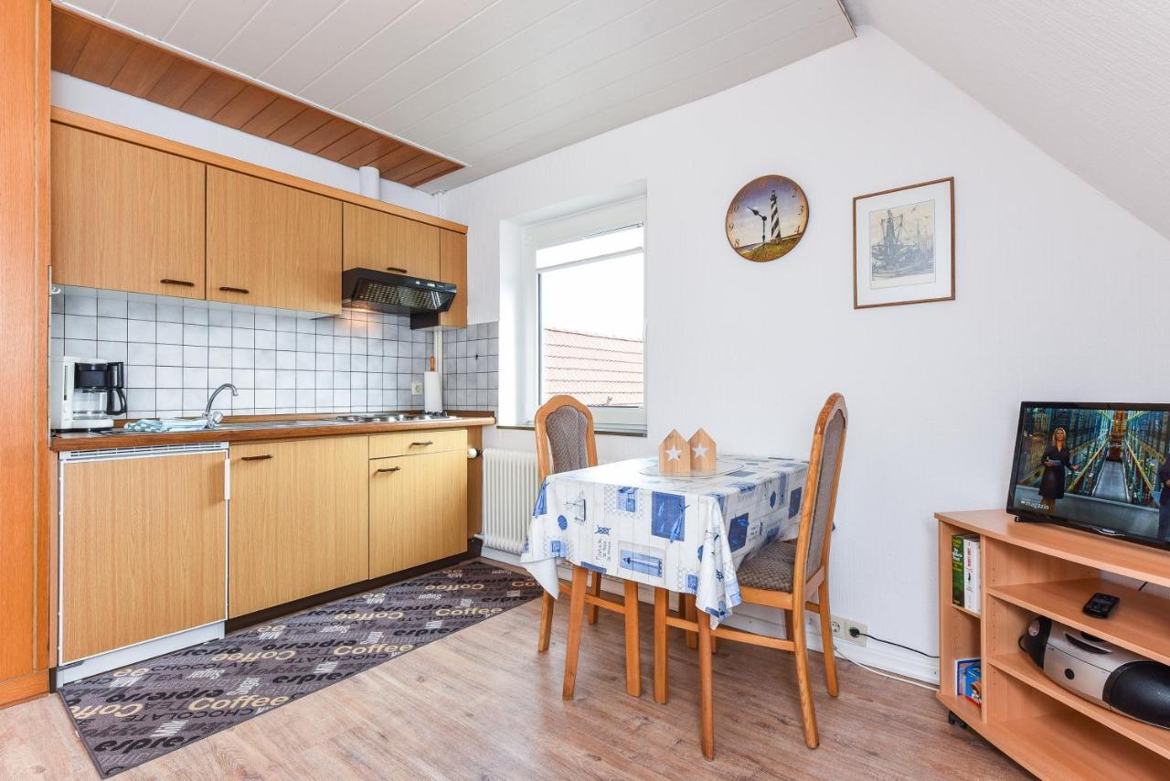 Ferienwohnungen Im Haus Waterkant Neuharlingersiel Exterior foto